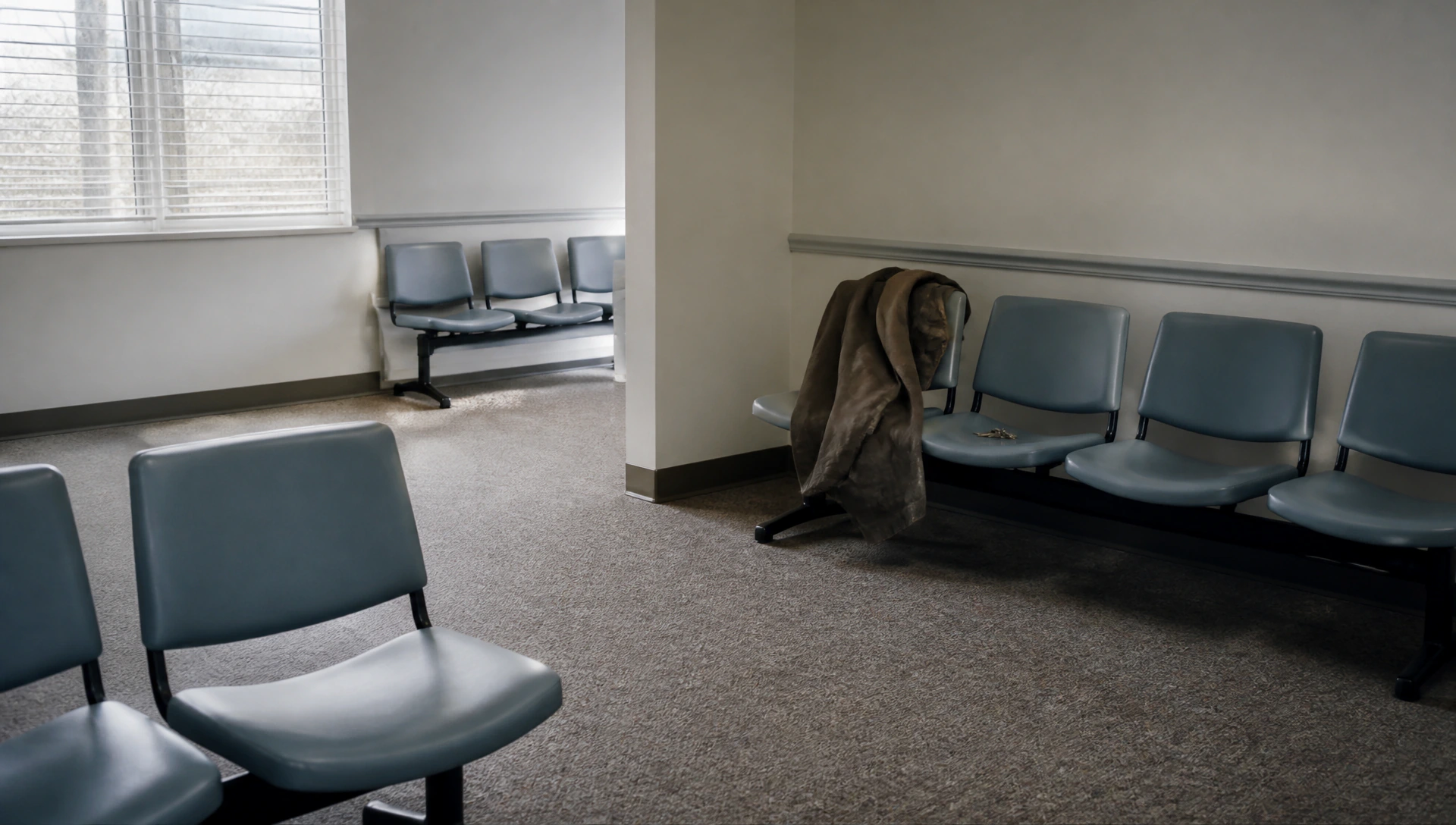 Somebody sat here long enough to leave their coat and go.