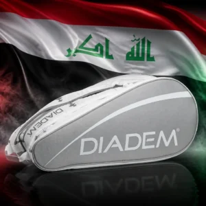 beginner tennis classes Fort Lauderdale Beach — the Diadem Tour V3 Tennis Bag (9 Racquet) and the flag of Iraq combined by the model into a single photoreal composition. The red, white and black horizontal tricolour fills the frame with the flag's own green Kufic takbir inscription across the centre of the white band, the cloth lit from one side so the folds carry the light along the stripes, and the black nine-racquet bag is composed into the arrangement so its long profile and the horizontal bands read as one deliberate design, with no added lettering of any kind anywhere in the picture beyond the flag's own inscription.