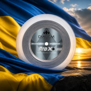 best cardio tennis — the Diadem Pro X 18g Tennis String Reel and the flag of Ukraine combined by the model into a single photoreal composition. The two equal horizontal bands, blue above and yellow below, fill the frame in deep folds with the light raking across so the blue deepens into shadow and the yellow burns where it catches, and the blue reel of hexagonal string is composed into the arrangement so the coil sits on the line where the two bands meet and reads as one designed object, with no lettering anywhere in the picture.