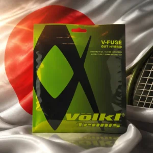Beverly Heights cardio tennis class — the Volkl V-Fuse 17g Tennis String Set composed together with the national flag of Japan in one photoreal studio composition — the white field and crimson sun disc filling the background in soft folds, lit from one side, the packet of string standing clear in front of it. Nobody wears, holds or uses it, and there are no words, letters, numerals or lettering of any kind anywhere in the frame.