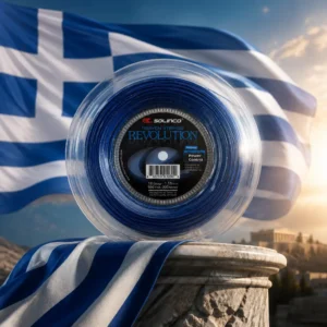 Beverly Heights tennis classes — the Solinco Heaven Strings Revolution 18g Tennis String Reel and the flag of Greece combined by the model into a single photoreal composition. The nine alternating blue and white stripes fill the frame with the white cross on its blue square at the upper hoist, the cloth lifted on a sea wind so the folds break the stripes into moving bands of light, and the blue reel is composed into the arrangement so that the round flange and the square canton balance each other as one object, with no lettering anywhere in the picture.