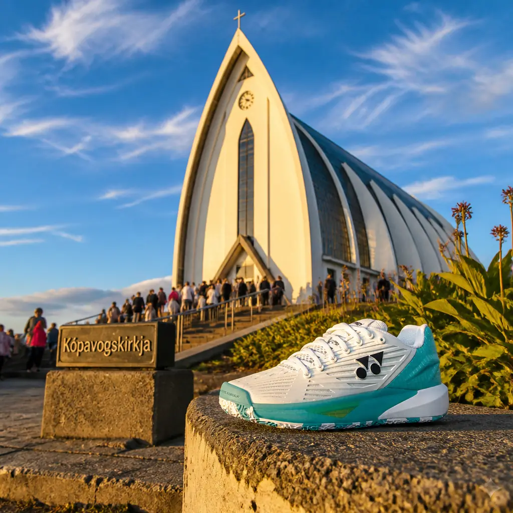 cardio tennis classes in 33020 — Kópavogskirkja in Kópavogur, A white modernist church with sweeping parabolic arches forming its roofline, standing alone on the rocky Borgarholt hill with views over Kópavogur and the bay