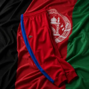 evening cardiovascular tennis clinic — Lacoste Sport Run Resistant Men's Track Pants composed with the national flag of Afghanistan